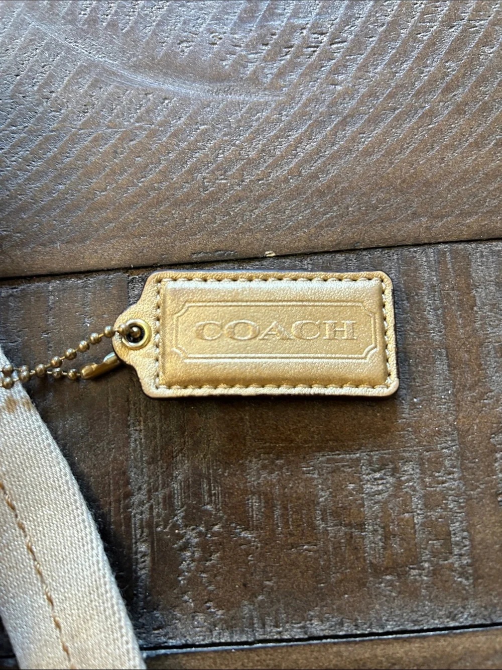 Coach crossbody gold fabric with hot pink inside